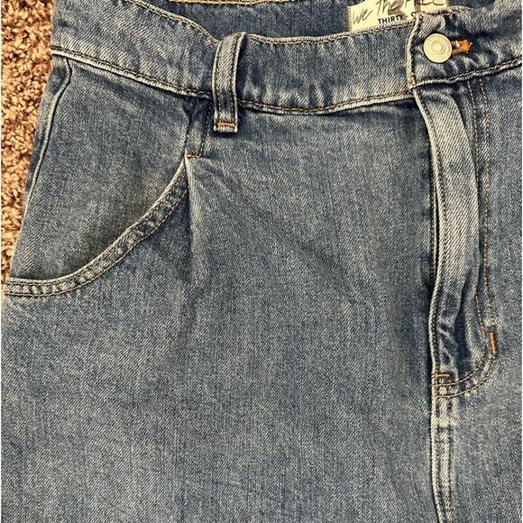 We The Free People Cosmico Flirt Denim Pleated Raw Hem Mini Skirt Rain Wash 31 - Picture 4 of 8